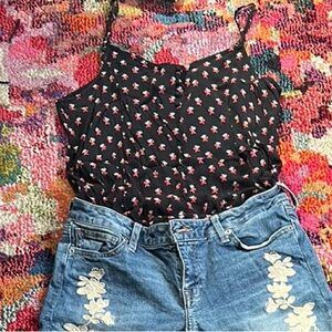 Floral button-detail tank top.